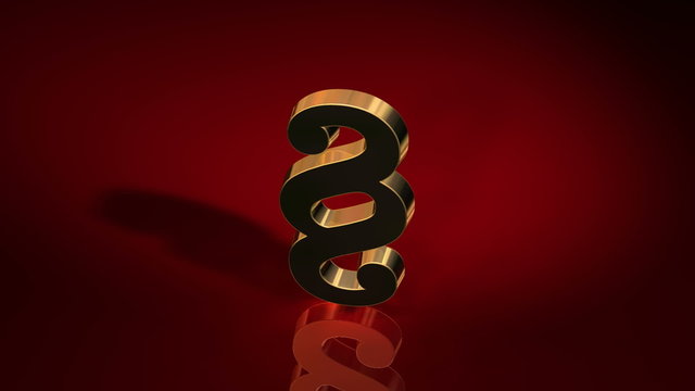 goldenes Paragraphenzeichne auf rotem Hintergrund