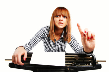 Business woman portrait in office with vintage typing machine