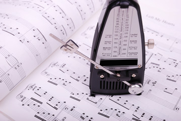 Fototapeta premium metronome on the sheet music