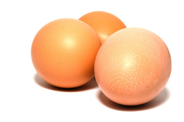 Three eggs isolated on white.