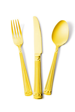 Gold Fork, Knife And Spoon Isolated On White