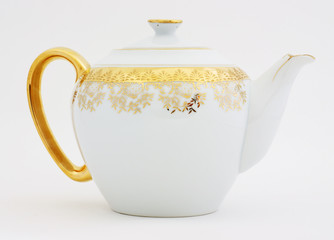 Ornate gold plated teapot.
