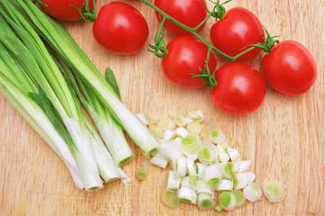 Green onion and red tomatoes.