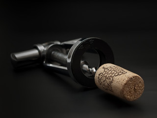 metal corkscrew with cork