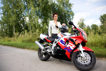 Fototapeta na wymiar girl with motorbike