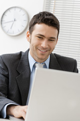 Businessman using laptop