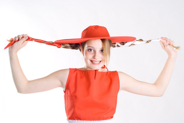 Joking girl with pigtails