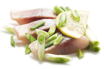 Herring with lemon and onion