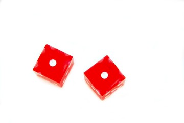 red dice snake eyes on white