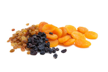 Composition from dried fruits on white background.