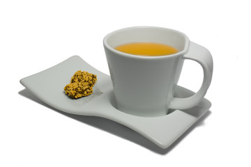 Cup of tea with chocolates