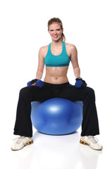 Woman With Dumbells and Exercise Ball