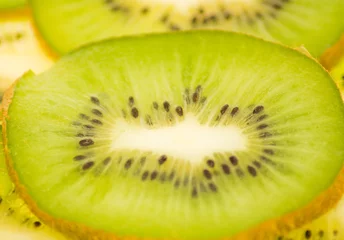 Papier Peint photo Tranches de fruits tranches de kiwi, arrière-plan, macro