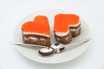 Two heart-shaped cakes on the plate