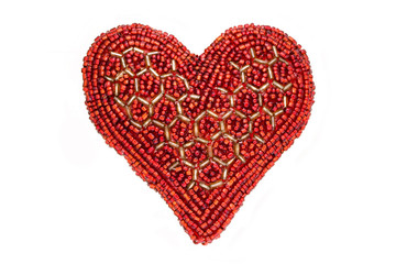 Valentine's Red Heart made of beads isolated on white