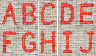 Oil paint alphabet on the canvas