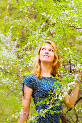 Young  woman and flowered tree