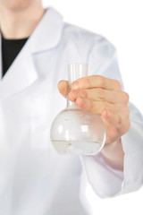 Chemist holds flask