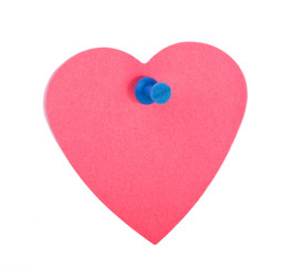 Red heart shaped note paper with blue pin