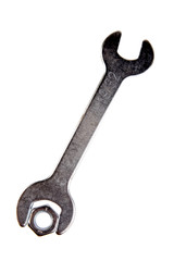 Wrench and nut isolated on white background