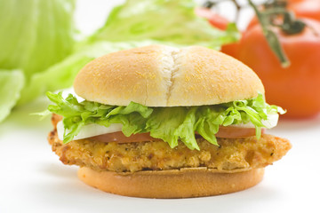 crisp chicken burger with tomato onion cheese lettuce