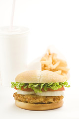 crisp chicken burger with tomato onion cheese lettuce