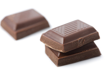 broken pieces of chocolate isolated