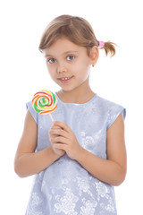 Girl with color lollipop in hand