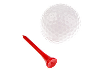 Golf ball and tee over white