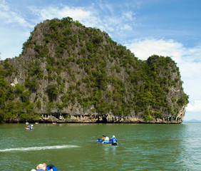 Fototapeta na wymiar tourists at sea canoe, Thailand