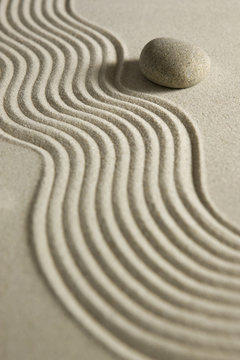 Stone on raked sand