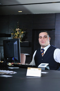 recetion man in hotel