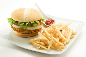 crisp chicken burger with tomato onion cheese lettuce