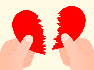 Two hands tearing a red heart apart