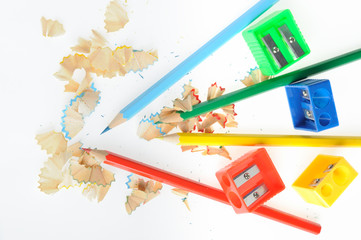 Color pencil and sharpener with a shaving