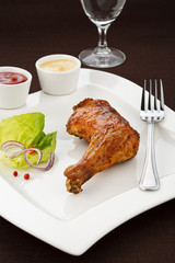 Roasted chicken leg with vegetables