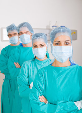 doctors in surgical gown