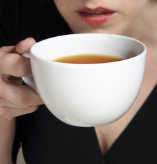 a sip from a cup of tea