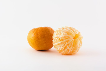 Two tangerines on a white background