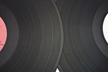 two old dusty scratched vinyl records background