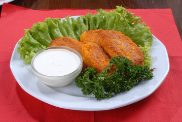 plate of tasty chops served with sauce