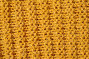 Yellow knitted wool texture
