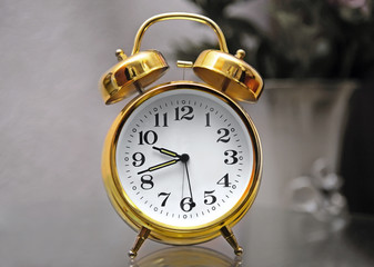 Golden alarm clock