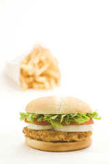 crisp chicken burger with tomato onion cheese lettuce
