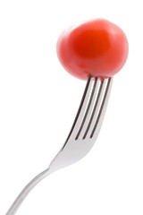 tomato on fork isolated