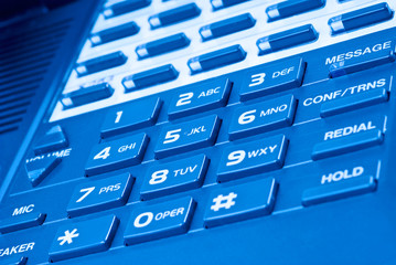 Close Up of Telephone Keypad with Blue Hue - 12017731