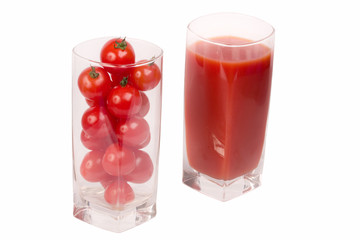 Tomatoes and juice on a white background