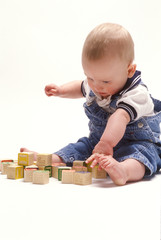 Baby boy with building blocks