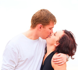 couple kissing close-up isolated over white