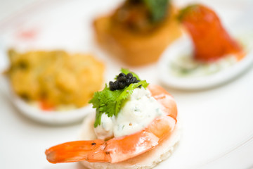 appetizer of shrimp with caviar